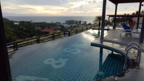Гостиница Sea and Sky Condominium Room #406  Карон